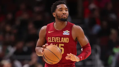 Donovan Mitchell #45 of the Cleveland Cavaliers dribbles up the court against the Chicago Bulls during the first half of a preseason game at the United Center