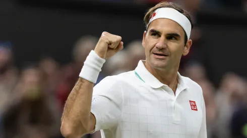 Roger Federer of Switzerland celebrates match point in his Men's Singles Fourth Round match against Lorenzo Sonego of Italy.
