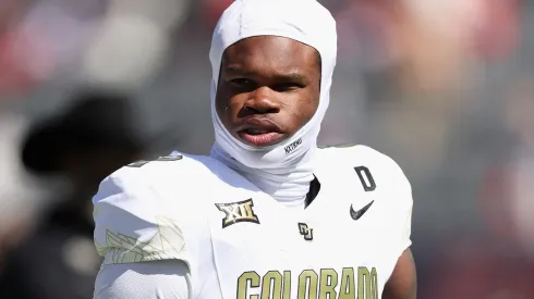 Wide receiver Travis Hunter #12 of the Colorado Buffaloes warms up before the NCAAF game against the Arizona Wildcats at Arizona Stadium on October 19, 2024 in Tucson, Arizona.
