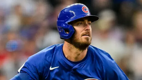  Cody Bellinger #24 of the Chicago Cubs follows the flight of his fourth inning solo home run against the Colorado Rockies at Coors Field on September 14, 2024 in Denver, Colorado.
