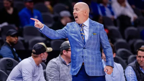 UCLA Bruins head coach Mick Cronin yells at his bench during the first half against the Ohio State Buckeyes in the CBS Sports Classic matchup at State Farm Arena in Atlanta, GA.
