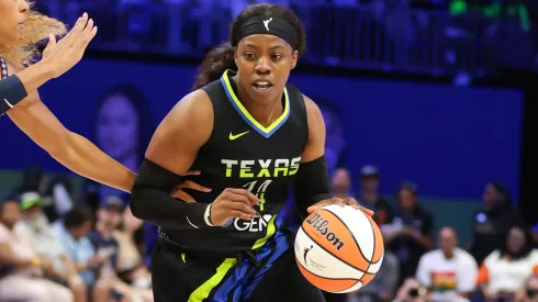 Arike Ogunbowale drives towards the basket during the WNBA
