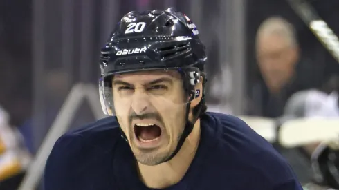  Chris Kreider #20 of the New York Rangers prepares to play against the Pittsburgh Penguins at Madison Square Garden on December 06, 2024 in New York City.
