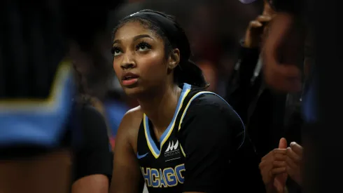 Chicago Sky forward Angel Reese listens during a team huddle in a game against the Indiana Fever 
