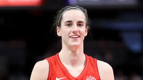 Caitlin Clark of Indiana Fever smiles against the Chicago Sky