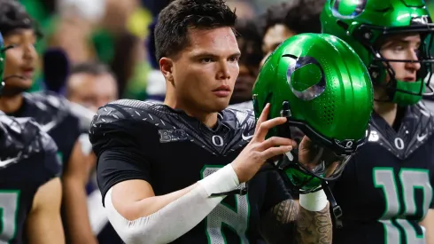 Oregon Ducks quarterback Dillon Gabriel (8) warming up before the NCAA, College League, USA Big Ten Championship football game between the Penn State Nittany Lions and the Oregon Ducks at Lucas Oil Stadium in Indianapolis, Indiana.
