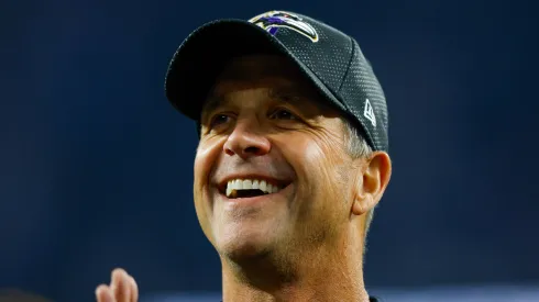 Baltimore Ravens head coach John Harbaugh smiles after a game.
