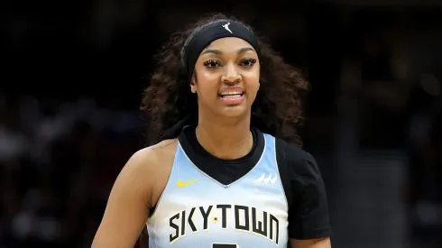 Angel Reese of the Chicago Sky looks on during the game against the Seattle Storm
