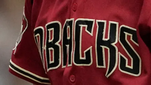 A close-up of Paul Sewald's #38 Arizona Diamondbacks jersey, showcasing the team logo, taken after their 5-2 victory over the Milwaukee Brewers in Game Two of the Wild Card Series at American Family Field on October 4, 2023, in Milwaukee, Wisconsin.