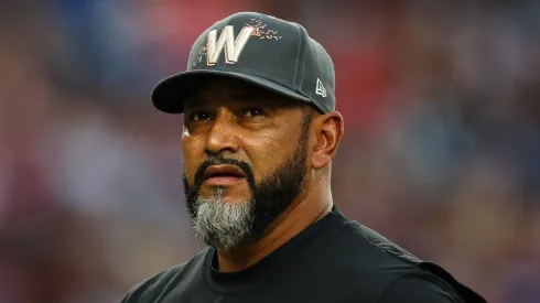 Manager Dave Martinez #4 of the Washington Nationals looks on during the eighth inning against the Chicago Cubs at Nationals Park on August 31, 2024 in Washington, DC. 
