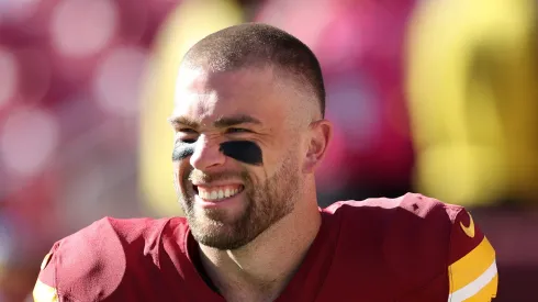 Zach Ertz #86 of the Washington Commanders smiles prior to the game against the Carolina Panthers at Northwest Stadium on October 20, 2024 in Landover, Maryland.