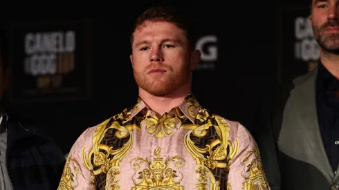 Boxer Canelo Alvarez poses with his championship belts at the end of the press conference during the press tour for his fight against Gennady Golovkin on June 27, 2022 in New York City.