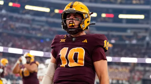 Arizona State quarterback Sam Leavitt (10) gestures after scoring a rushing touchdown during the first half of the Big 12 Championship football game between the Arizona State Sun Devils and the Iowa State Cyclones on December 7, 2024 in Arlington, Texas. Arizona State won, 45-19.