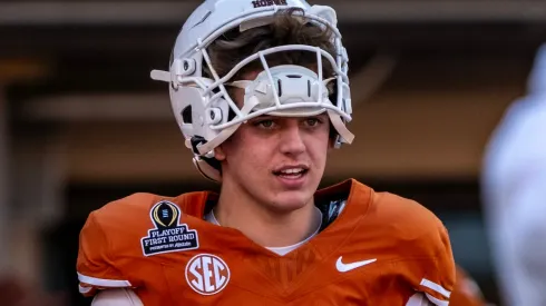 Arch Manning 16 of the Texas Longhorns during warmups before the game vs the Clemson Tigers in the first round of the playoffs at DKR-Memorial Stadium.
