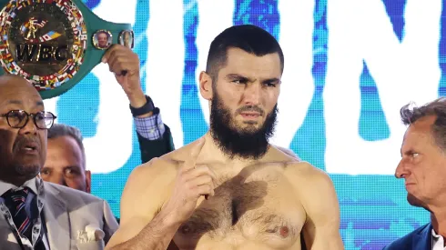 Artur Beterbiev reacts as he poses for a photo ahead of the IBF, IBO, WBC and WBO World Light Heavyweight titles' fight between Artur Beterbiev and Dmitrii Bivol during the weigh-in as part of the Riyadh Season – IV Crown Showdown at The Venue on October 11, 2024 in Riyadh, Saudi Arabia. 
