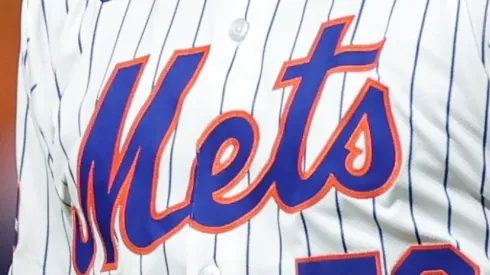 A jersey close-up of Sean Manaea #59 of the New York Mets reacting after a double play to end the sixth inning against the Philadelphia Phillies during Game Three of the Division Series at Citi Field in New York City.
