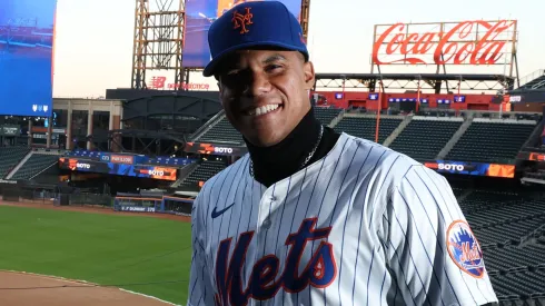 Juan Soto of the New York Mets poses with his new uniform after his introductory press conference at Citi Field on December 12, 2024 in New York City.
