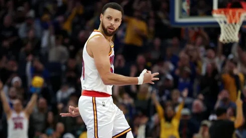 Stephen Curry #30 of the Golden State Warriors reacts after he made a three-point basket against the Philadelphia 76ers during the second half at Chase Center.
