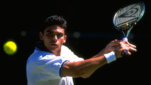 Mark Philippoussis of Australia in action during day five of the championships played at the All England Club in Wimbledon.
