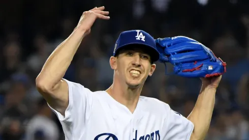 Walker Buehler reacts after retiring the side on a strike out during the seventh inning against the Boston Red Sox in Game Three of the 2018 World Series at Dodger Stadium.