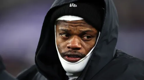 Lamar Jackson #8 of the Baltimore Ravens looks on from the bench during the fourth quarter against the Cleveland Browns at M&T Bank Stadium on January 04, 2025 in Baltimore, Maryland.