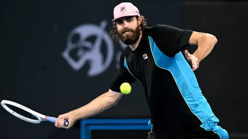 Reilly Opelka of the USA plays a forehand in his match against Giovanni Mpetshi Perricard.
