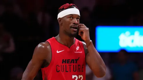 Jimmy Butler #22 of the Miami Heat react against the Dallas Mavericks during overtime at Kaseya Center on November 24, 2024 in Miami, Florida.
