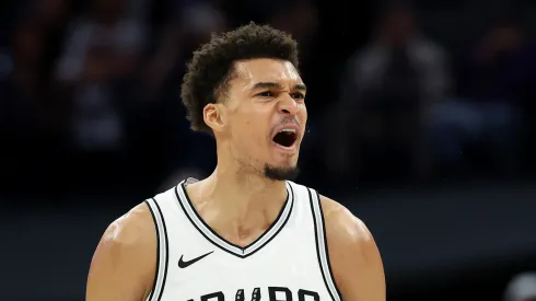 Victor Wembanyama #1 of the San Antonio Spurs reacts after the Spurs made a basket against the Sacramento Kings
