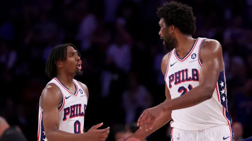 Tyrese Maxey #0 and Joel Embiid #21 of the Philadelphia 76ers talk during the second half against the New York Knicks at Madison Square Garden on April 30, 2024 in New York City.
