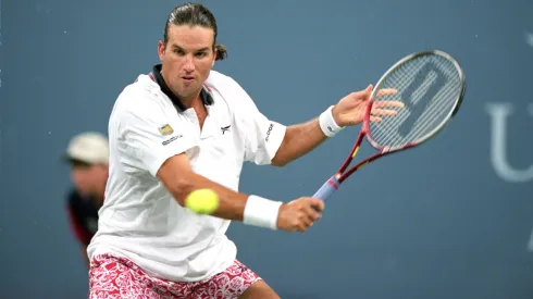 Patrick Rafter of Australia returns the ball during the U.S. Open.
