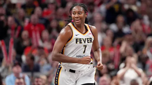 Aliyah Boston of Indiana Fever smiles after a basket during the first half against the Minnesota Lynx 
