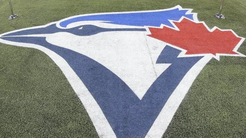 The Toronto Blue Jays logo painted on the field during batting practice before the Toronto Blue Jays home opener.
