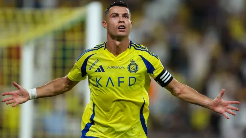  Cristiano Ronaldo of Al Nassr celebrating after scores the 1st goal during the Saudi Pro League match between Al Nassr and Al Raed at Al Awwal Park Stadium on August 22, 2024 in Riyadh, Saudi Arabia.
