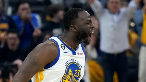 Draymond Green #23 of the Golden State Warriors reacts after a three point basket against the Los Angeles Lakers
