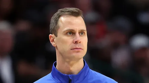 Head coach Jon Scheyer of the Duke Blue Devils watches from the bench in the Elite 8 round of the NCAA Men's Basketball Tournament against the North Carolina State Wolfpack at American Airlines Center on March 31, 2024 in Dallas, Texas.