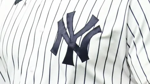 A close-up of Aaron Judge's #99 jersey from the New York Yankees reacting after striking out swinging in the fifth inning against the Washington Nationals at Yankee Stadium.