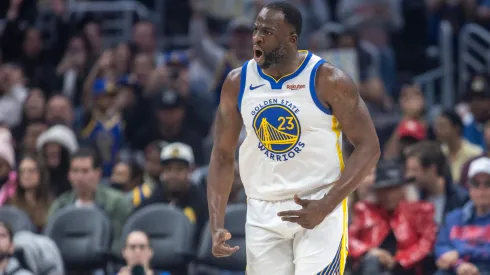 Draymond Green reacts to making a basket in the first half of a game between the Golden State Warriors and Los Angeles Clippers