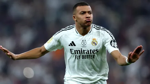Kylian Mbappe of Real Madrid celebrates scoring his team's first goal during the Spanish Super Cup Final between Real Madrid and FC Barcelona at King Abdullah Sports City on January 12, 2025 in Jeddah, Saudi Arabia.