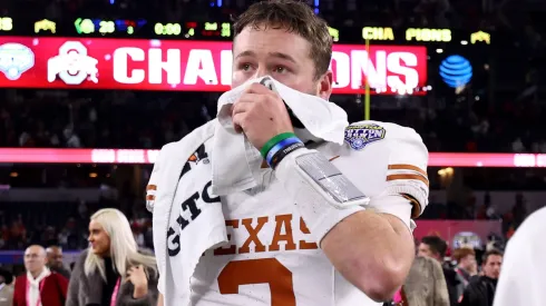 Quinn Ewers #3 of the Texas Longhorns walks off the field after losing to the Ohio State Buckeyes 28-14 in the Goodyear Cotton Bowl at AT&T Stadium on January 10, 2025 in Arlington, Texas.