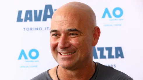 Andre Agassi poses at the Lavazza Cafe at Grand Slam Oval during day four of the 2019 Australian Open.
