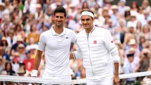 Novak Djokovic and Roger Federer pose together ahead of the 2019 Wimbledon Men's Singles Final