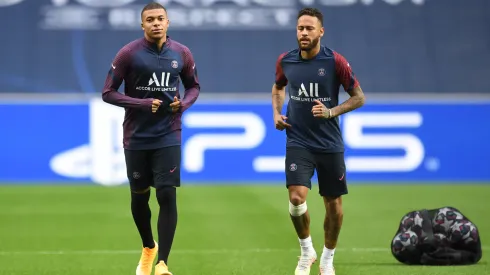 Neymar and Kylian Mbappe of PSG look on during the PSG Training Session ahead of the UEFA Champions League Quarter Final match between Atalanta and PSG at Estadio do Sport Lisboa e Benfica on August 11, 2020 in Lisbon, Portugal.