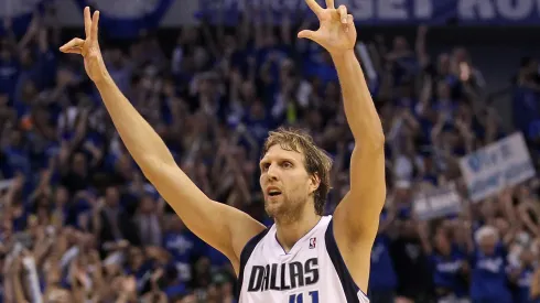 Dirk Nowitzki #41 of the Dallas Mavericks reacts after making a three-pointer in the fourth quarter while taking on the Oklahoma City Thunder in Game Five