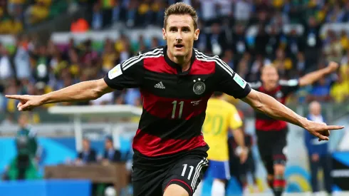 Miroslav Klose of Germany celebrates scoring his team's second goal during the 2014 FIFA World Cup Brazil Semi Final match between Brazil and Germany.