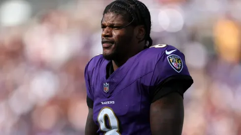 Lamar Jackson #8 of the Baltimore Ravens looks on as they play the Washington Commanders at M&T Bank Stadium on October 13, 2024 in Baltimore, Maryland.