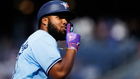 Vladimir Guerrero Jr. #27 of the Toronto Blue Jays reacts as he rounds the bases after hitting a solo-home run in the eighth inning of their MLB game against the Los Angeles Angels.