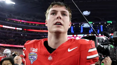 Will Howard #18 of the Ohio State Buckeyes celebrates after beating the Texas Longhorns 28-14 to win the Goodyear Cotton Bowl at AT&T Stadium on January 10, 2025 in Arlington, Texas.