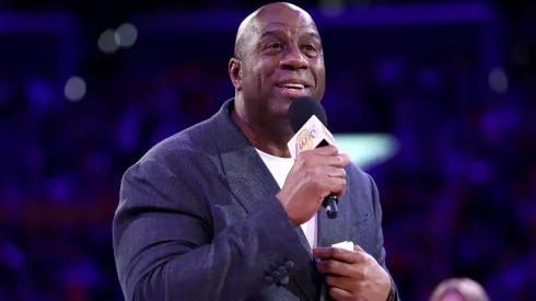 Magic Johnson speaks to the fans during the jersey retirement of Michael Cooper during halftime of the game between the Los Angeles Lakers and the San Antonio Spurs at Crypto.com Arena on January 13, 2025 in Los Angeles, California.
