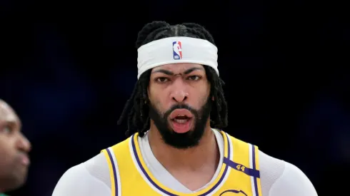 Anthony Davis #3 of the Los Angeles Lakers reacts after his basket in front of Al Horford #42 of the Boston Celtics