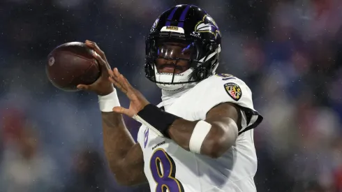Lamar Jackson #8 of the Baltimore Ravens warms up prior to the game against the Buffalo Bills in the AFC Divisional Playoff at Highmark Stadium on January 19, 2025 in Orchard Park, New York.
